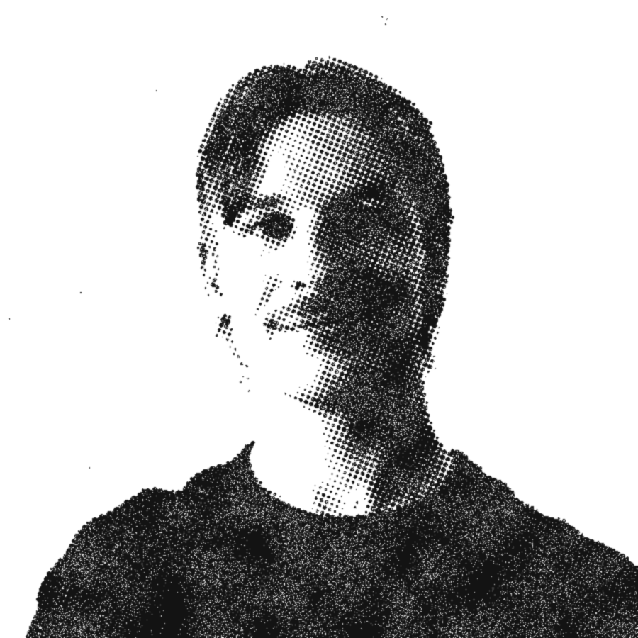 Harry Howard, smiling, in a dark t-shirt